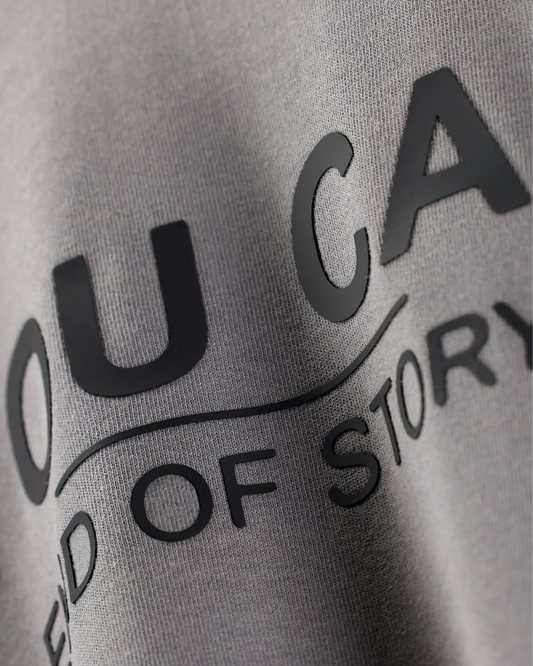 Asphalt T-shirt with You Can. End of Story text graphic, close-up detail view