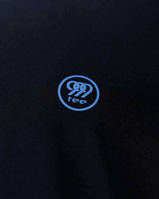 Black T-shirt close-up with blue 999tee chest logo detail