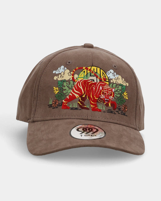 Front view of amber claw suede cap with embroidered tiger graphic.