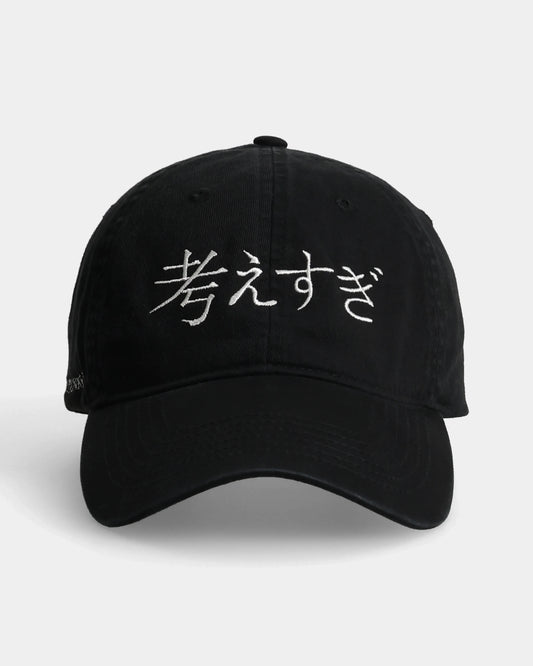 Front view of the Overthink dad cap with Japanese embroidery.