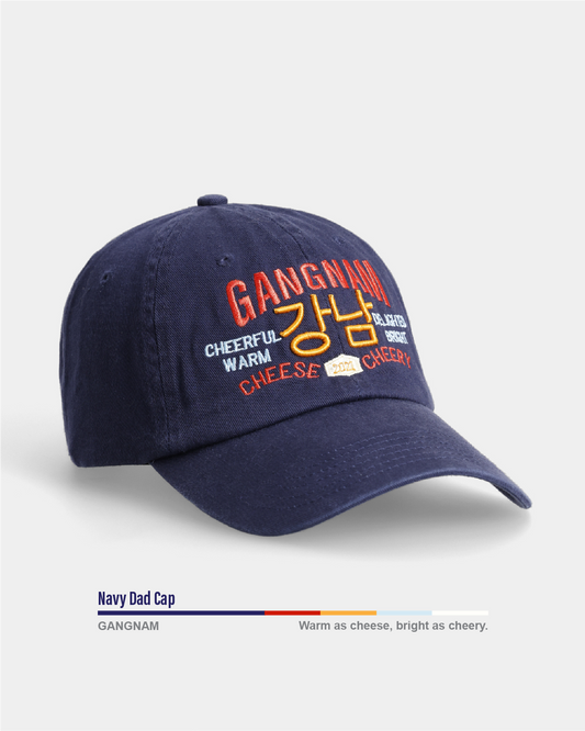 Navy blue dad cap with multicoloured embroidered text"Gangnam"