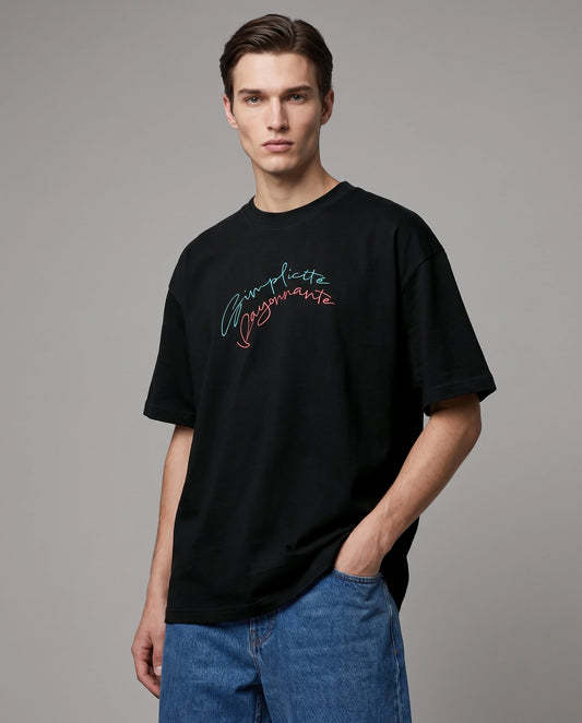 Female model wearing Radiant Simplicity oversized T-shirt with text, front view