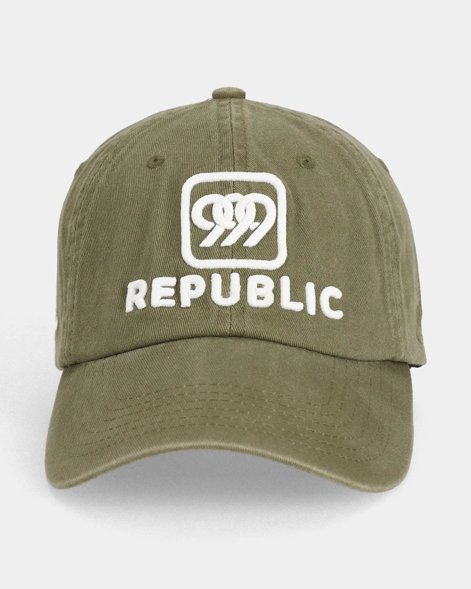 Olive dad cap with white REPUBLIC embroidery, front view