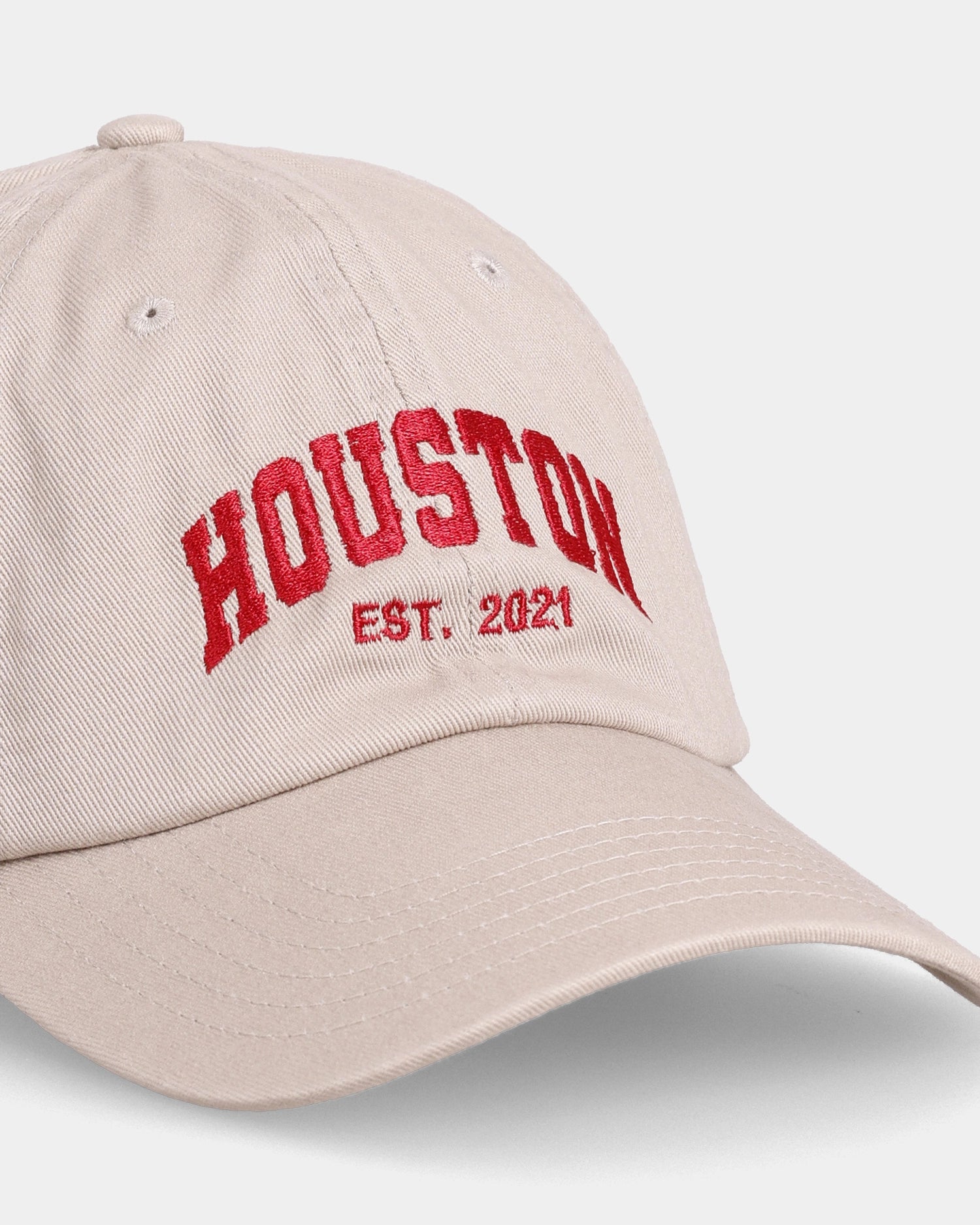 Khaki Houston dad cap close-up with embroidered front text detail