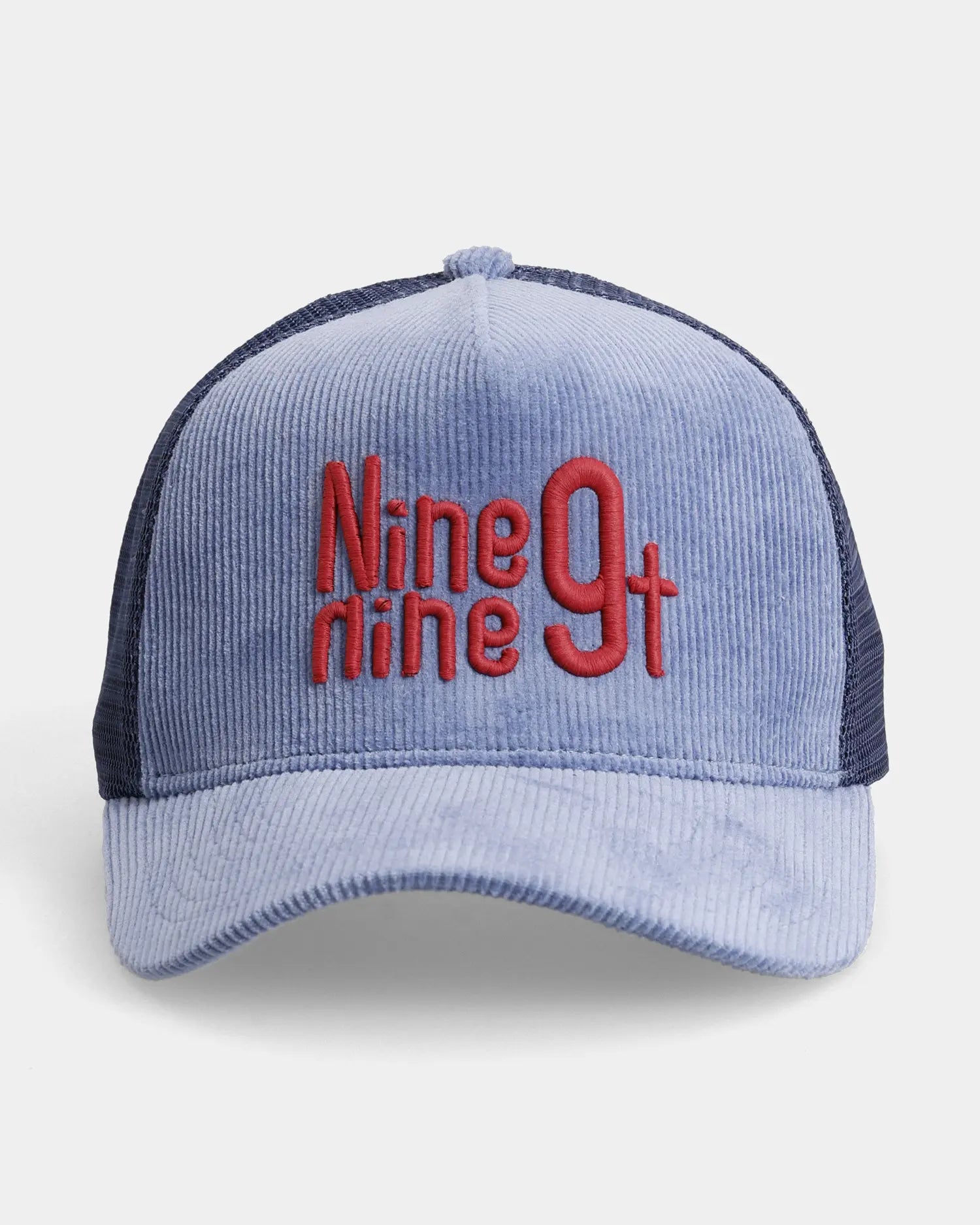 Blue corduroy trucker cap with red Nine9ninet embroidery, front view product shot
