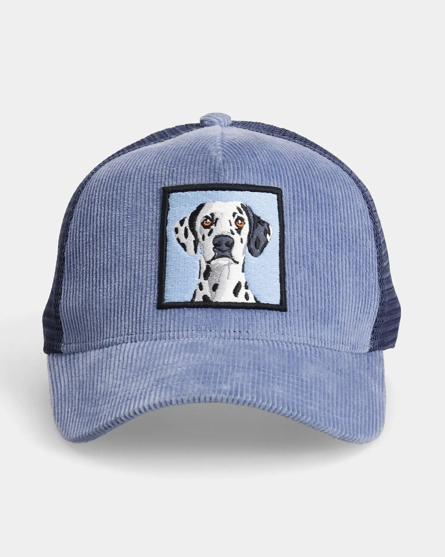Blue corduroy trucker cap with dog graphic patch, front view product shot
