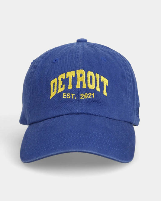 Navy dad cap with yellow DETROIT EST. 2021 embroidery, front view
