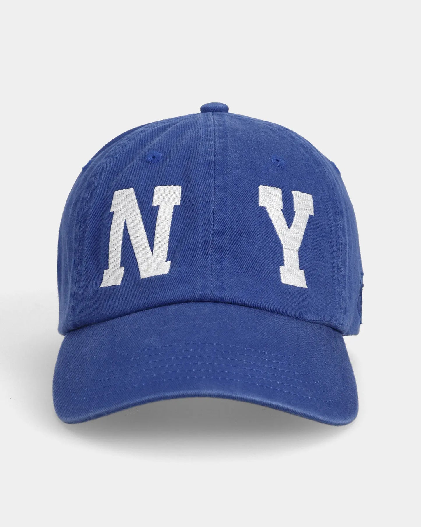 Blue dad cap with NY embroidery, front view
