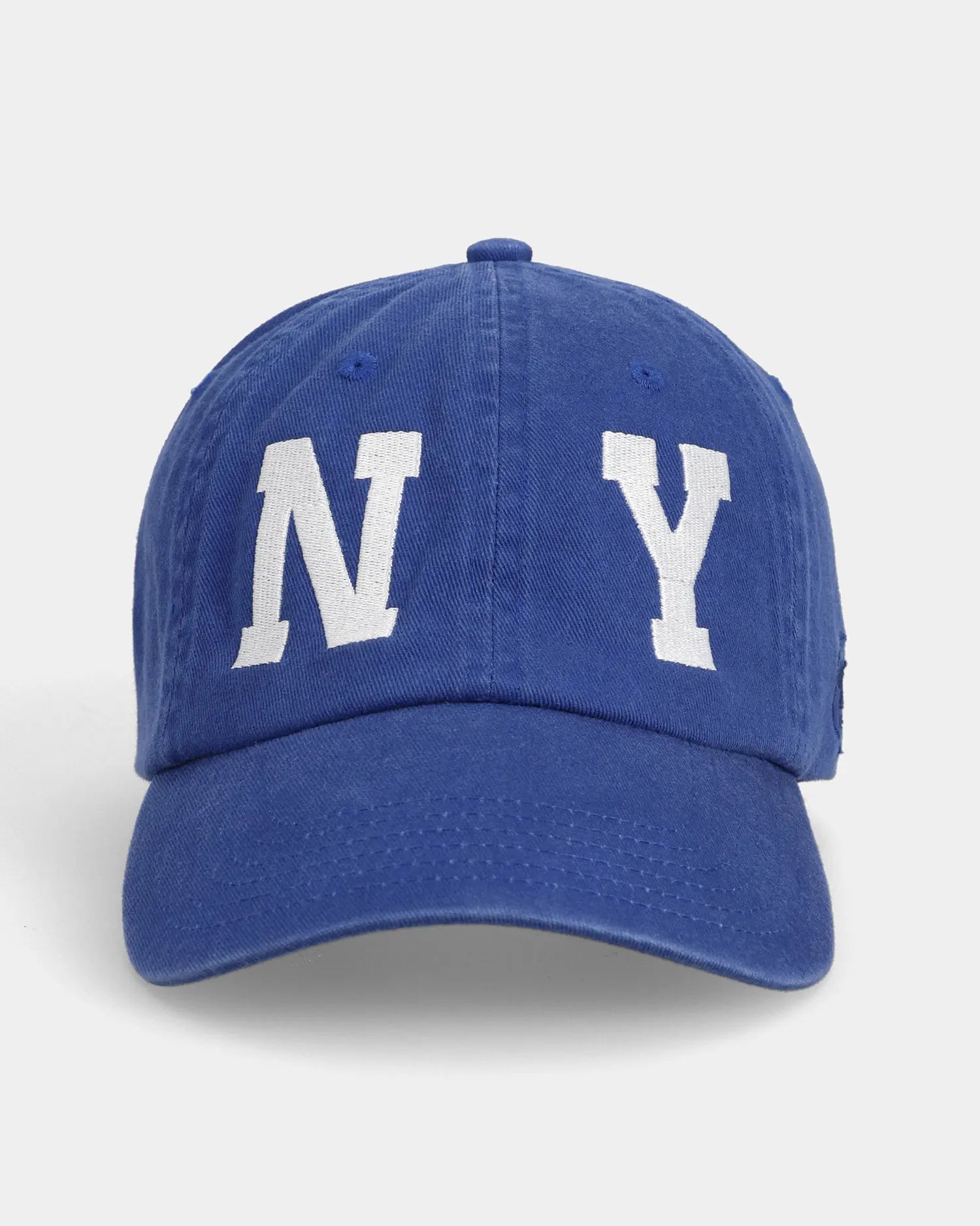 Blue dad cap with NY embroidery, front view
