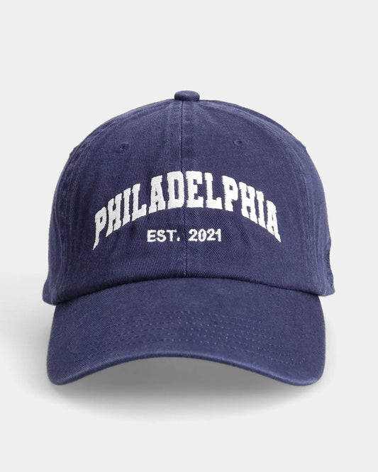 Navy dad cap with white “PHILADELPHIA” front embroidery and “EST. 2021”, front view
