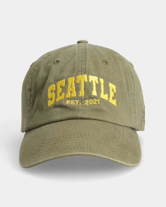 Olive cap with yellow SEATTLE EST. 2021 embroidery, front view
