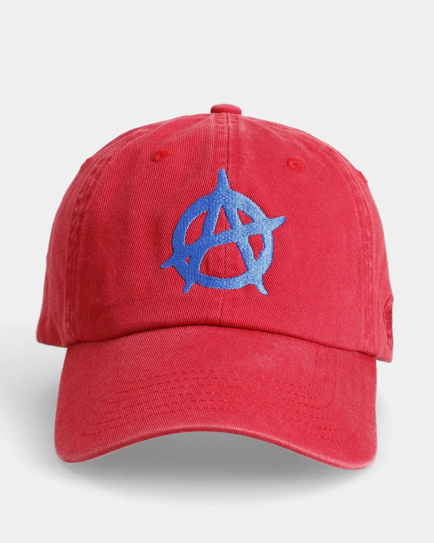Red dad cap front view with blue anarchy symbol embroidered detail