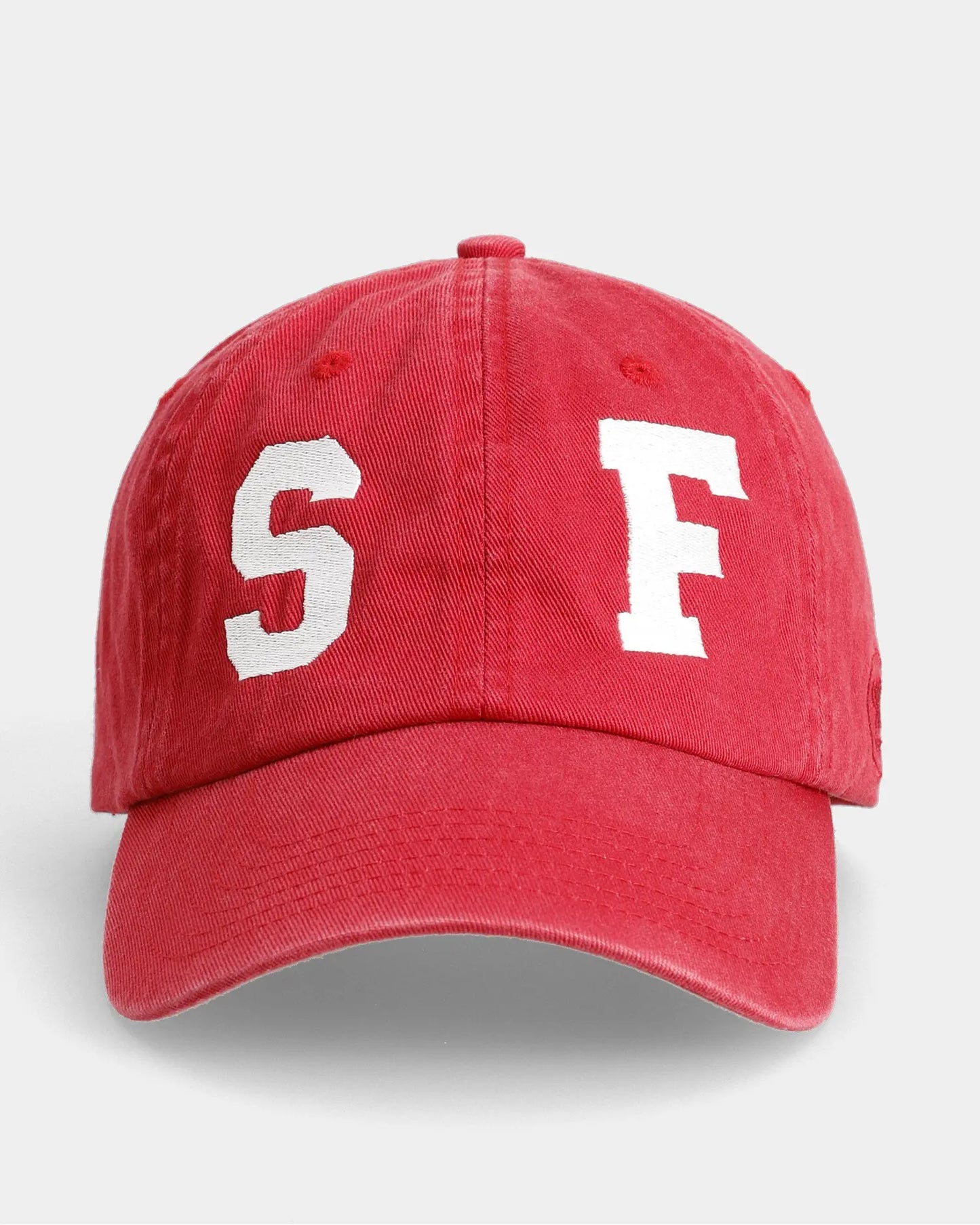 Red dad cap front view with SF embroidered front detail