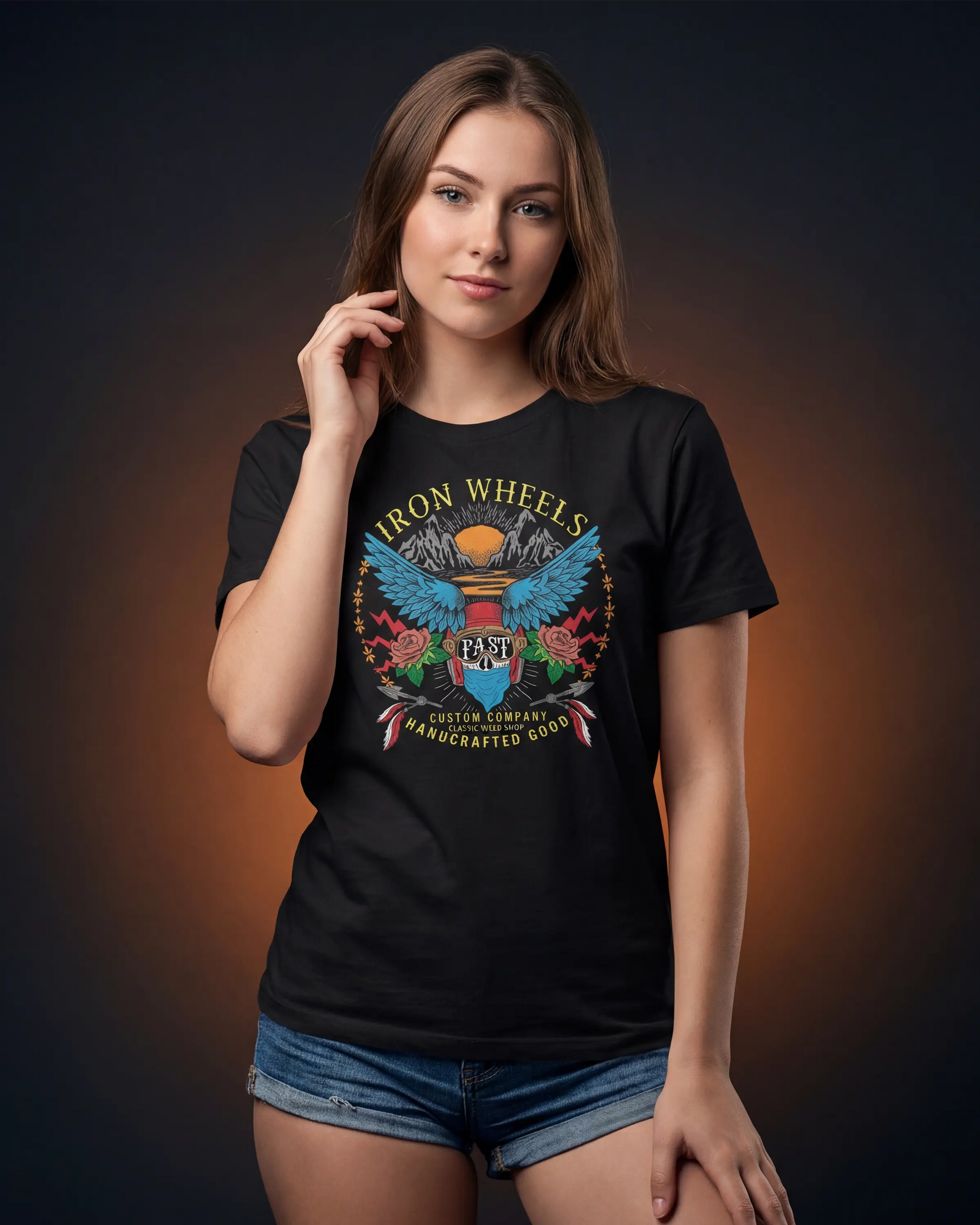 Model wearing black t-shirt with IRON WHEELS graphic, front view model shot
