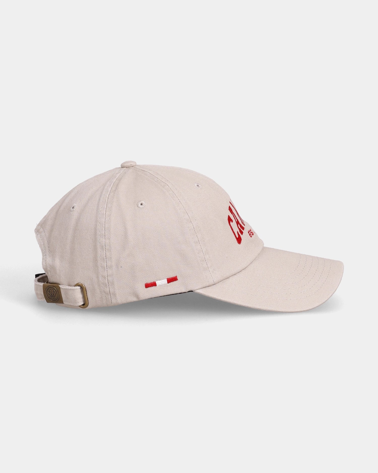 Khaki Canada dad cap with Canada flag side tag and buckle strap, side view
