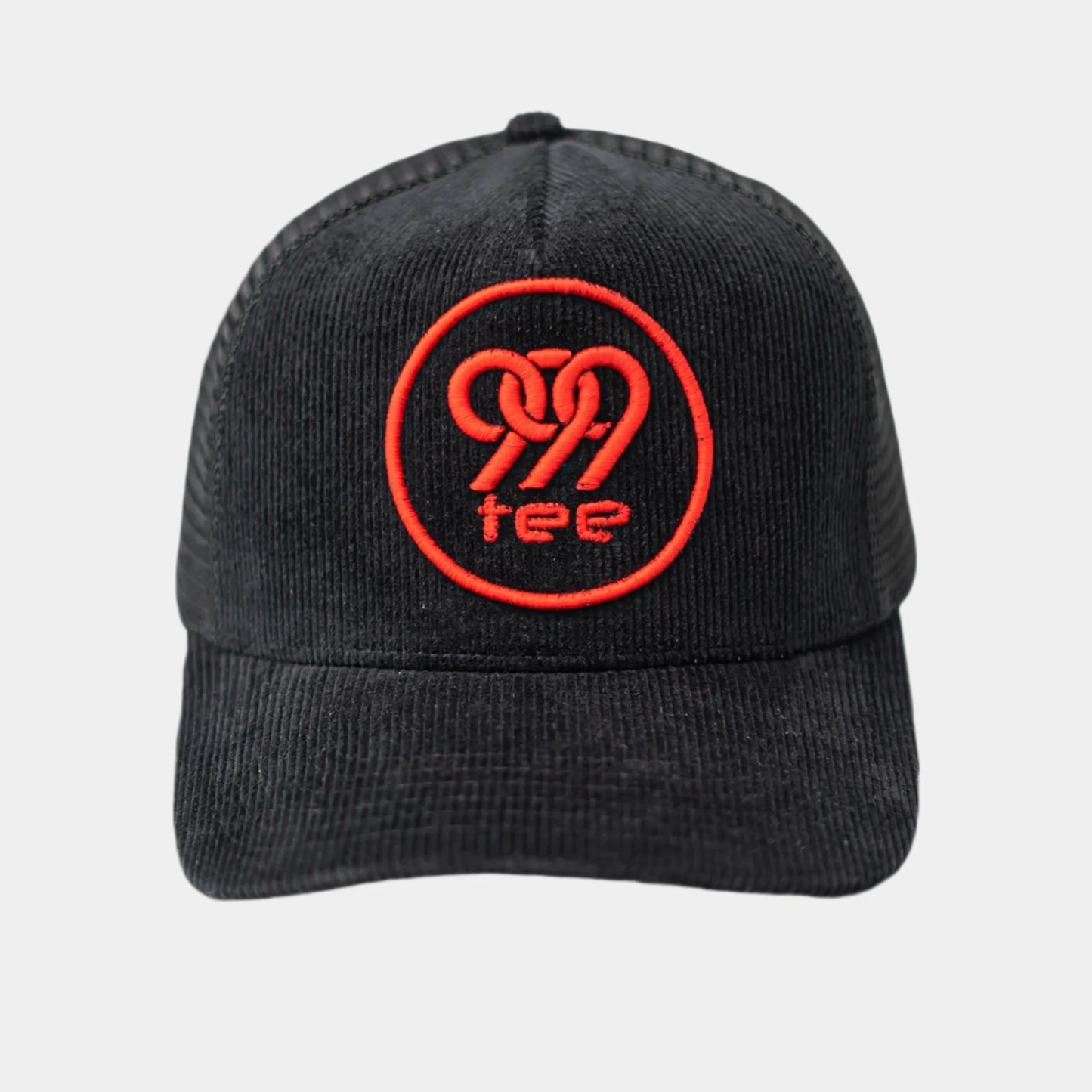 999Tee black coloured trucker cap with 999tee logo embroidered on it using red thread.