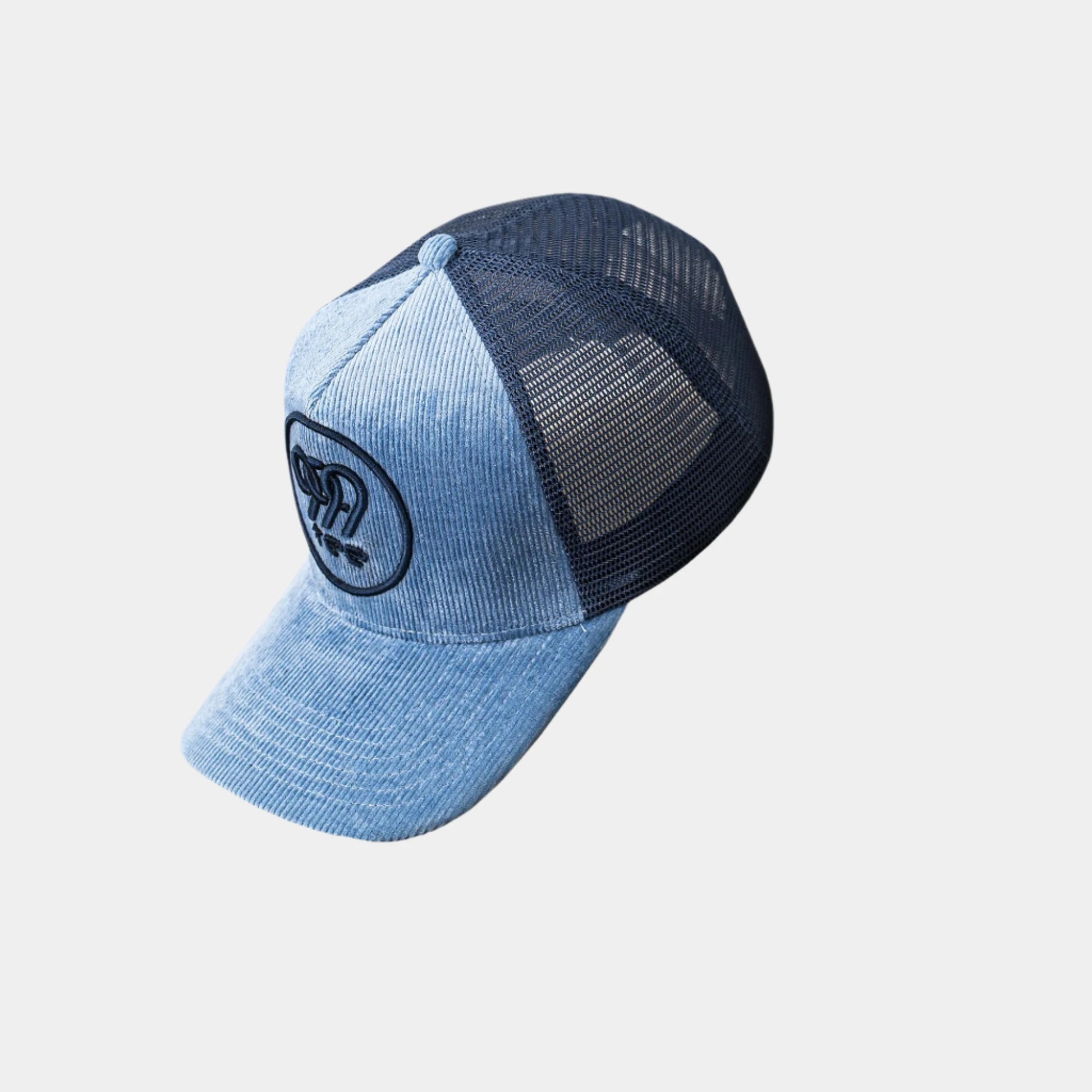 999Tee blue corduroy cap with 999tee logo embroidered on it using blue colored thread.