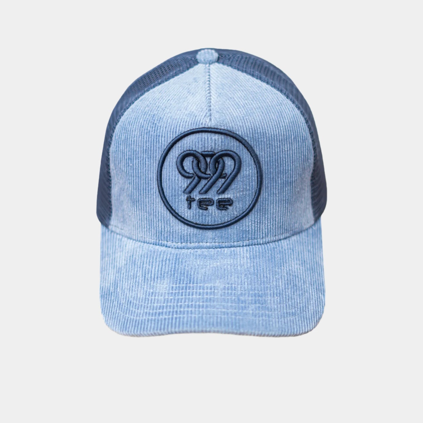 999Tee blue corduroy cap with 999tee logo embroidered on it using blue colored thread.