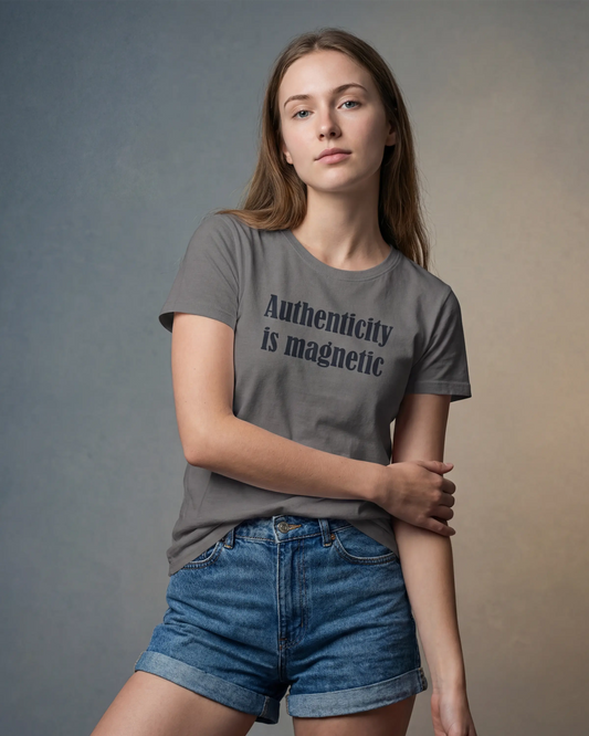 Model wearing asphalt t-shirt with Authenticity is magnetic text, front view model shot
