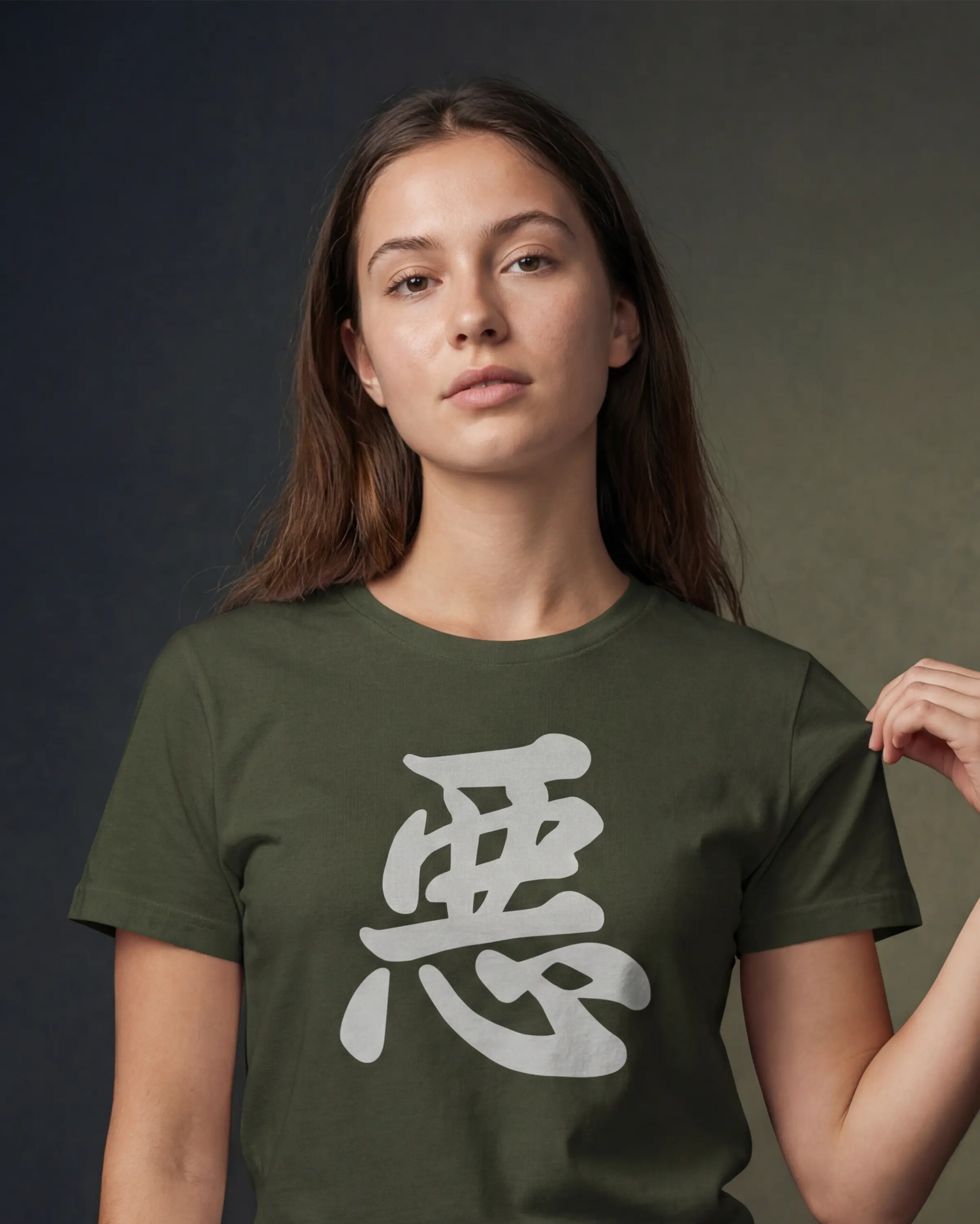Model wearing olive t-shirt with large kanji graphic, front view model shot

