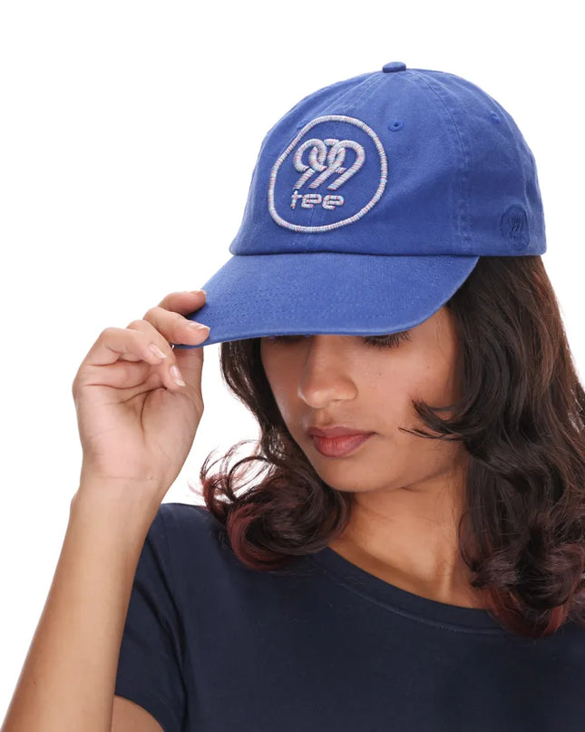 999Tee blue colored dad cap with 999tee logo 3d puff embroidery on it using multicoloured thread.