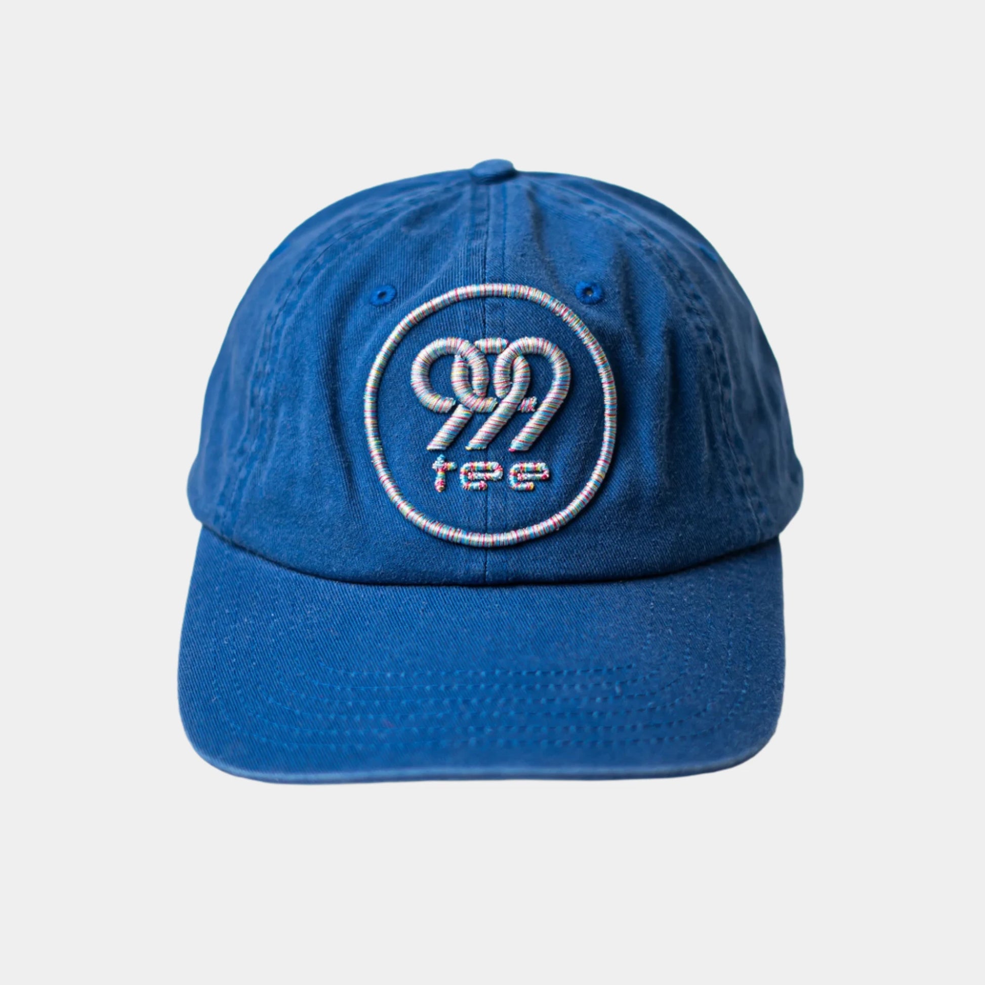 999Tee blue colored dad cap with 999tee logo 3d puff embroidery on it using multicoloured thread.