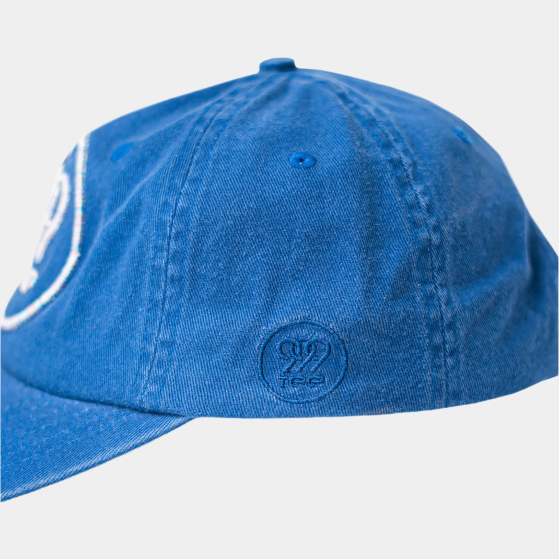 999Tee blue colored dad cap with 999tee logo 3d puff embroidery on it using multicoloured thread.