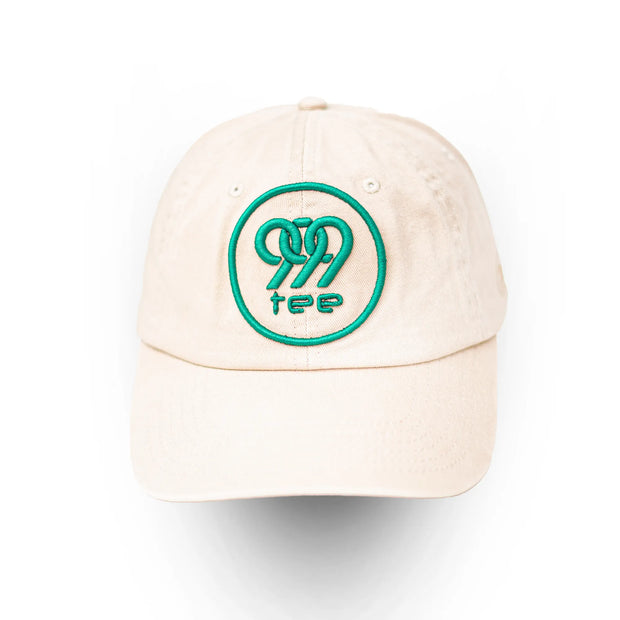 999Tee beige coloured dad cap with 3D Puff embroidered 999tee logo with jungle green coloured thread.