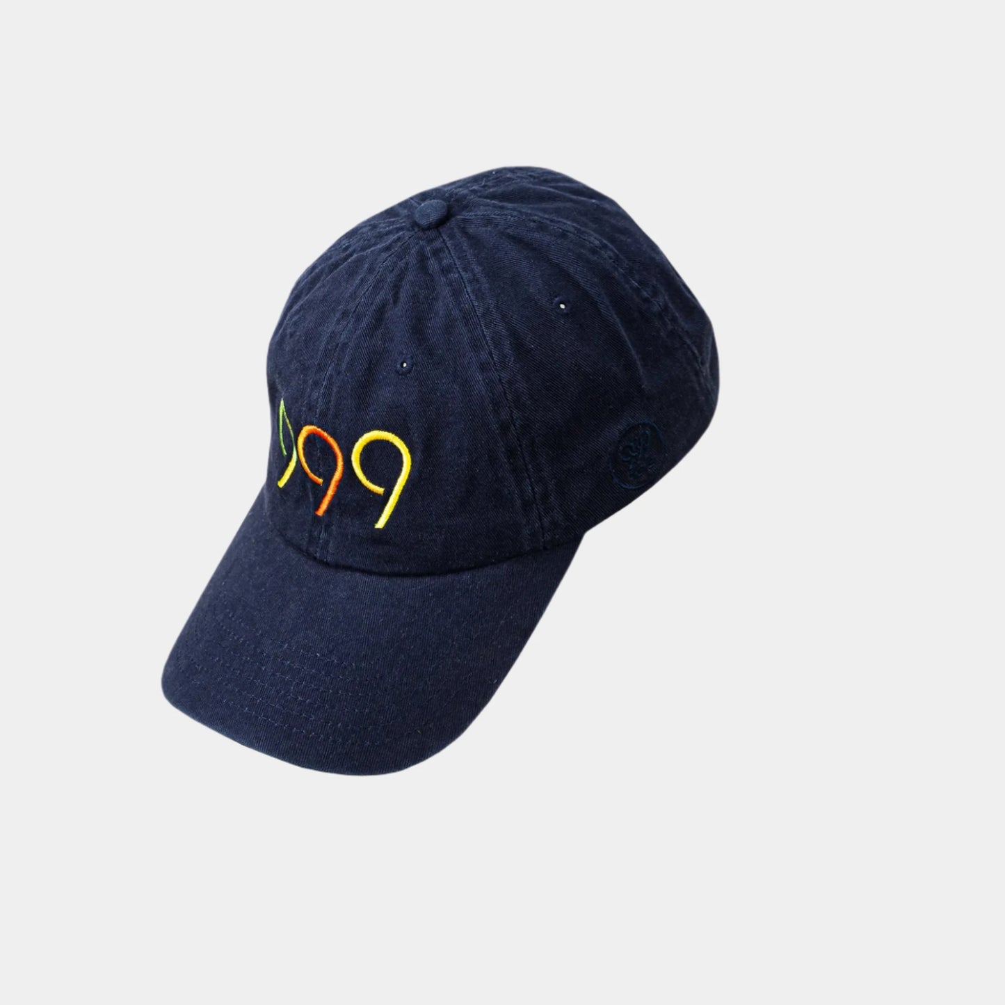 999Tee navy coloured dad cap with 999 embroidered on it with a colour gradient using coloreel technology.