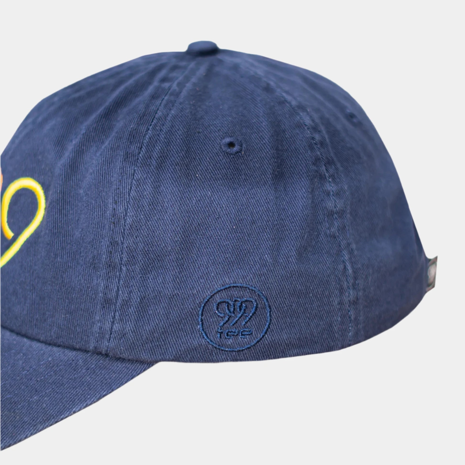 999Tee navy coloured dad cap with 999 embroidered on it with a colour gradient using coloreel technology.