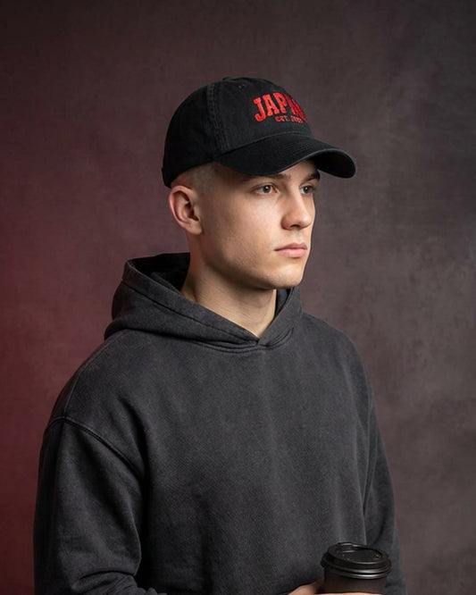 Black Japan embroidered dad cap on male model with black hoodie, 999TEE streetwear cap