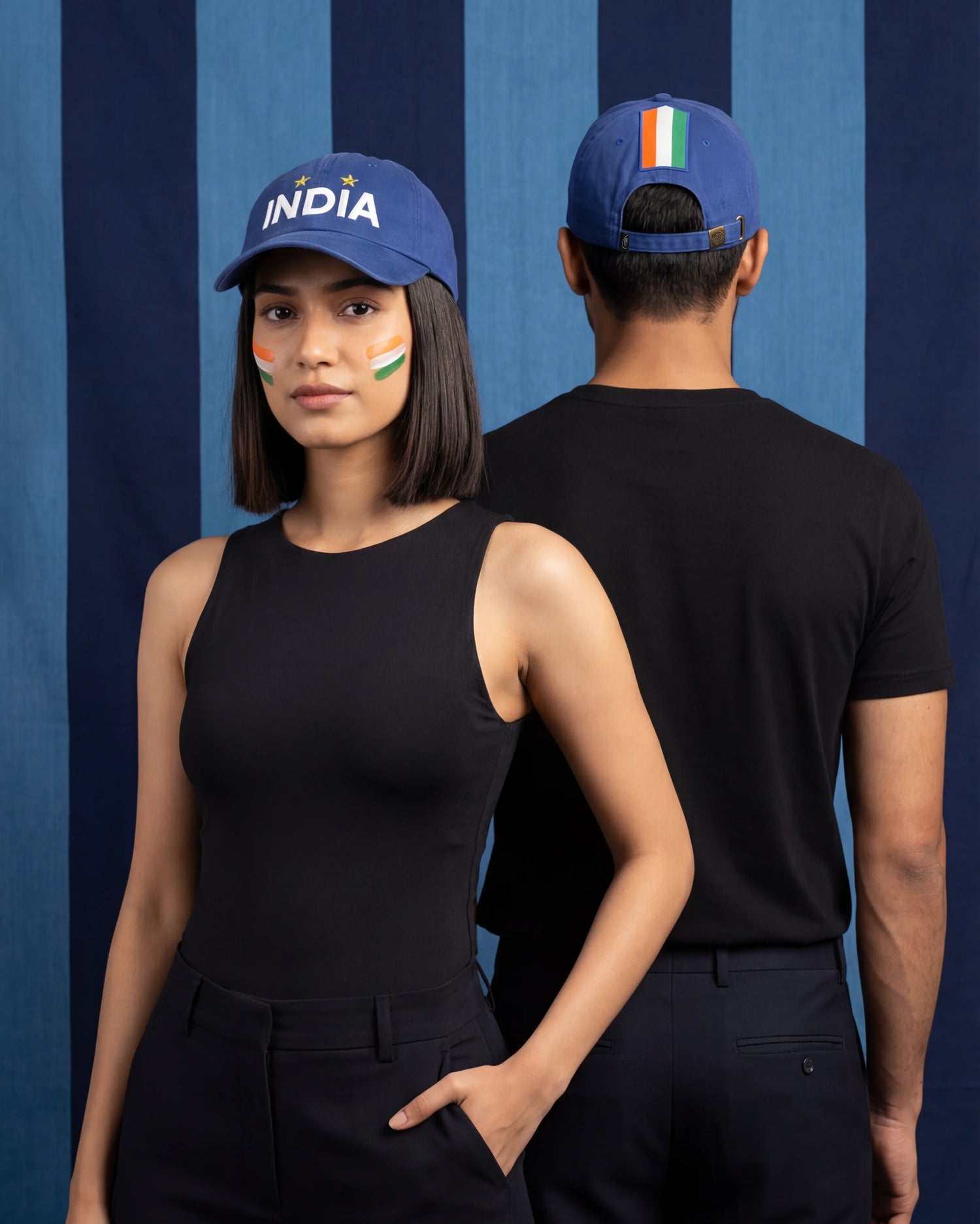Male and female models wearing blue INDIA dad cap, front and back view