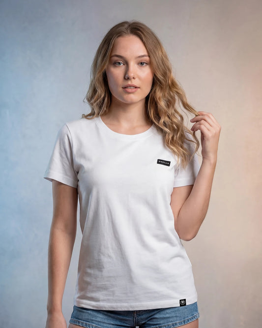 Female model wearing white t-shirt with small chest label, front view model shot
