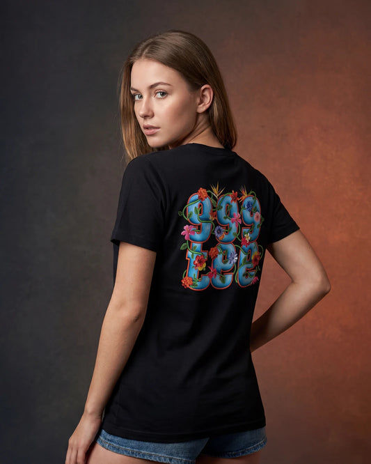 Female model wearing black t-shirt with 999 floral back graphic, back view model shot
