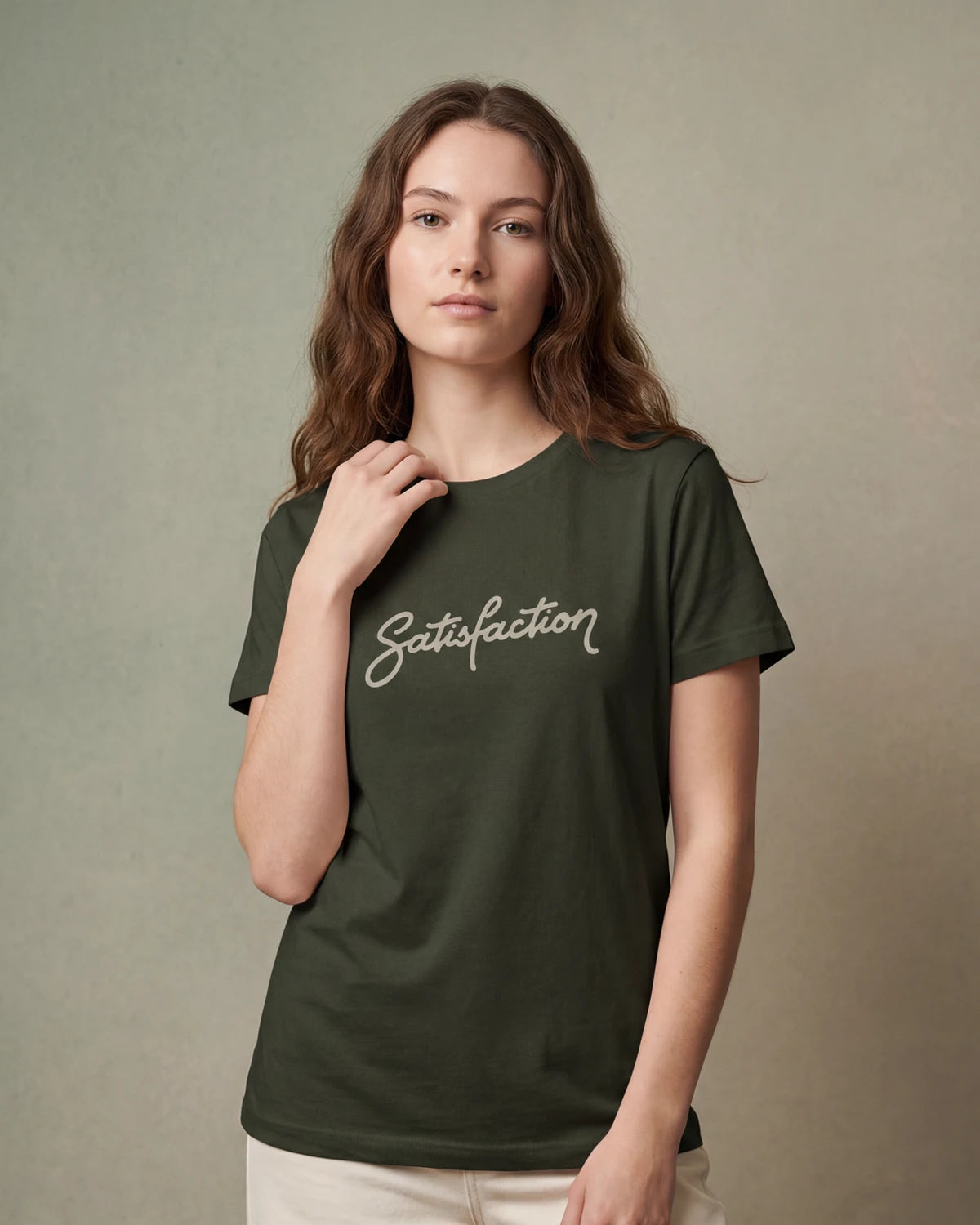 Model wearing olive t-shirt with Satisfaction script, front view

