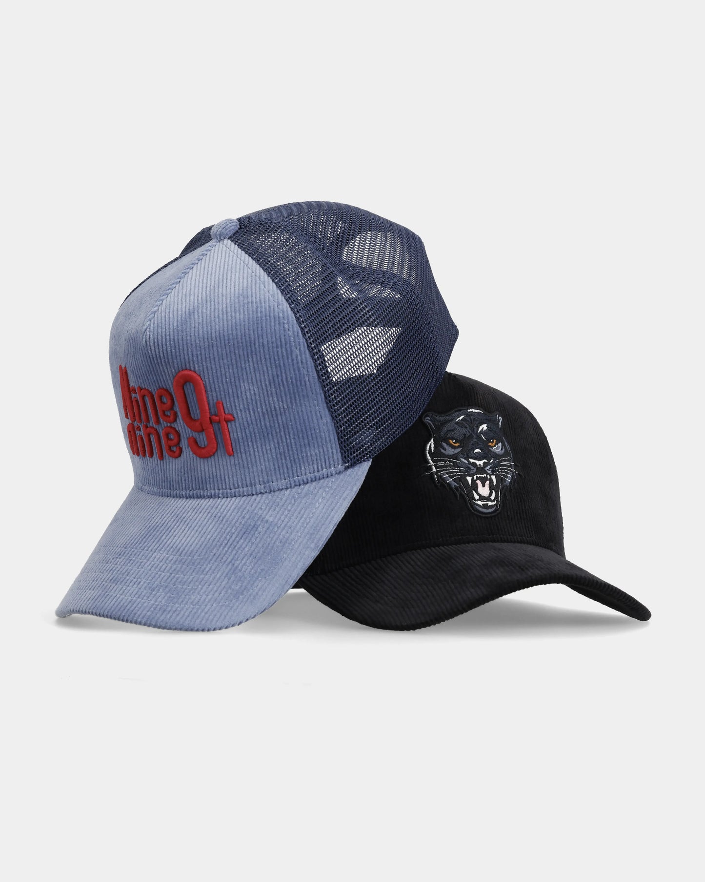 Panther and Vol.09 Matt Trucker Caps, stacked front product shot