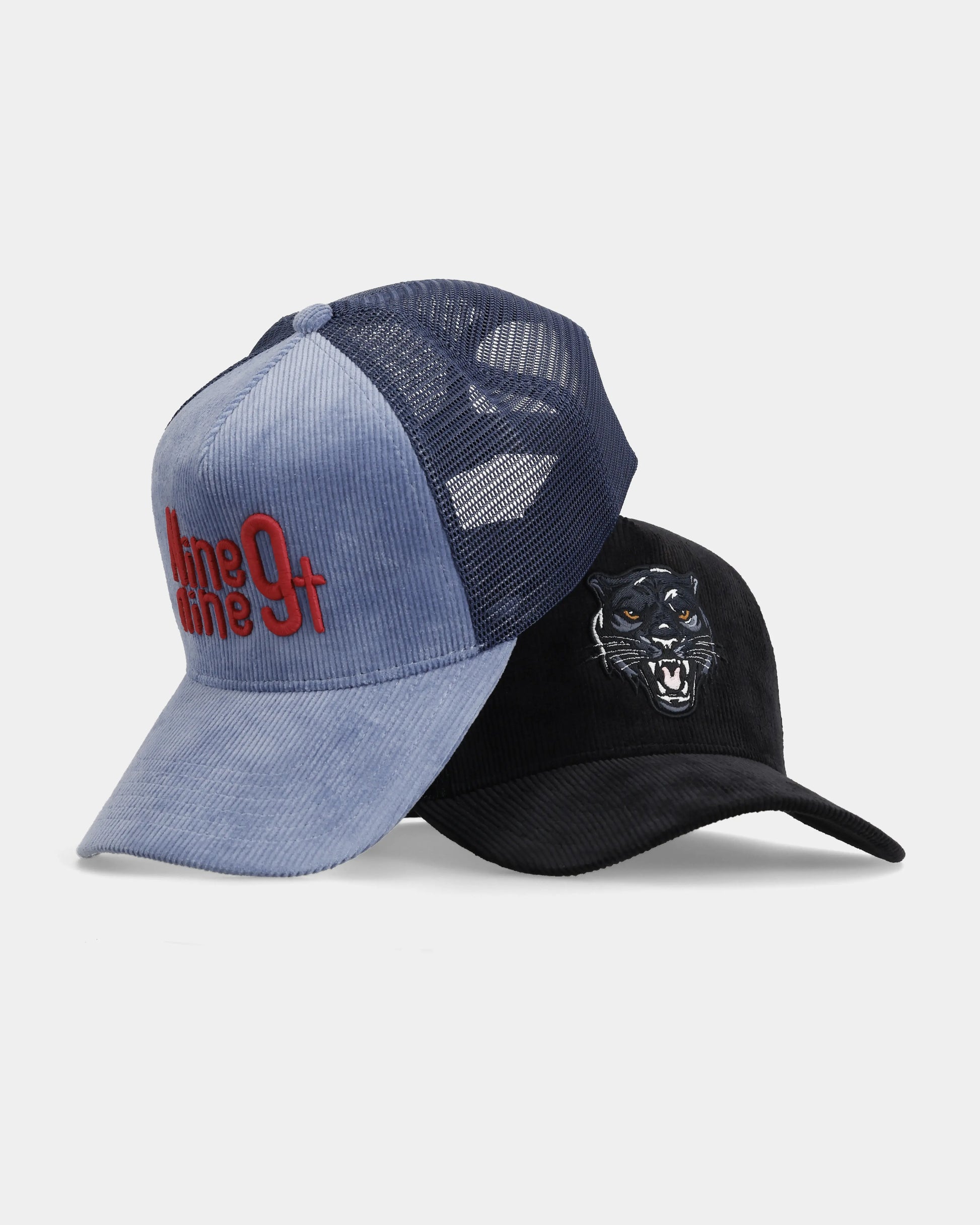 Panther and Vol.09 Matt Trucker Caps, stacked front product shot