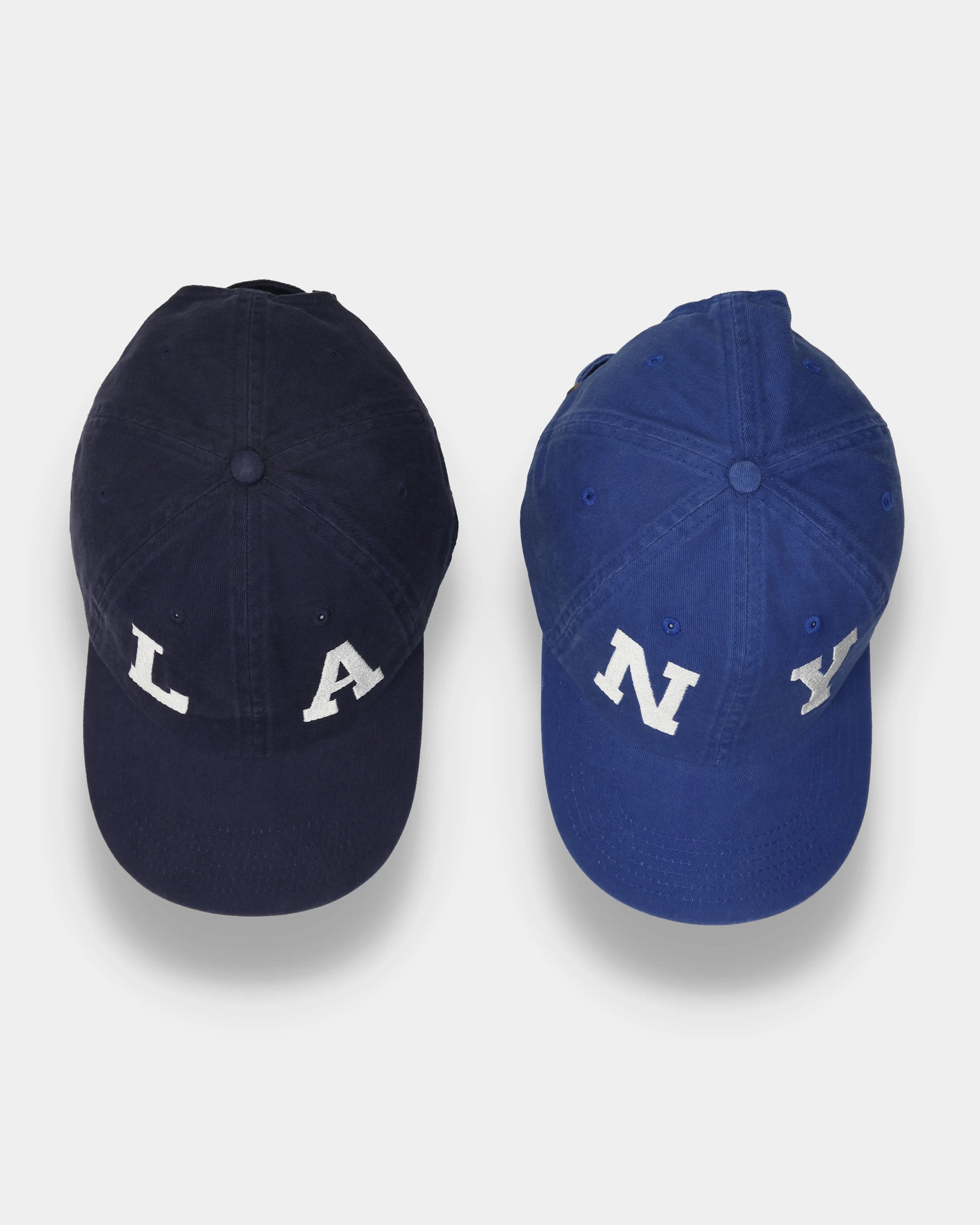 NY#05 and LA#03 Dad Caps, top view comparison with letter embroidery