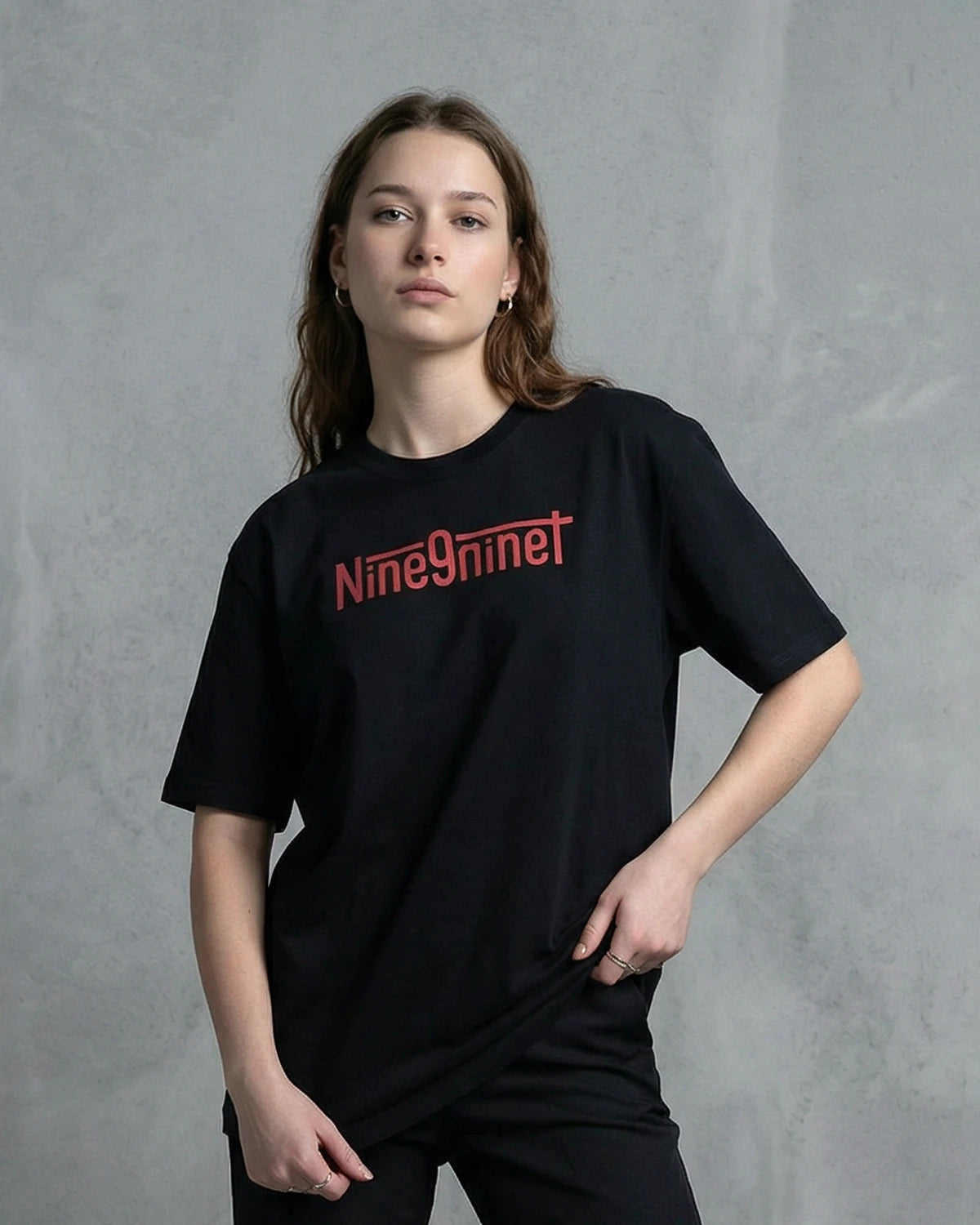 Female model wearing Haunted Lady oversized T-shirt, front view