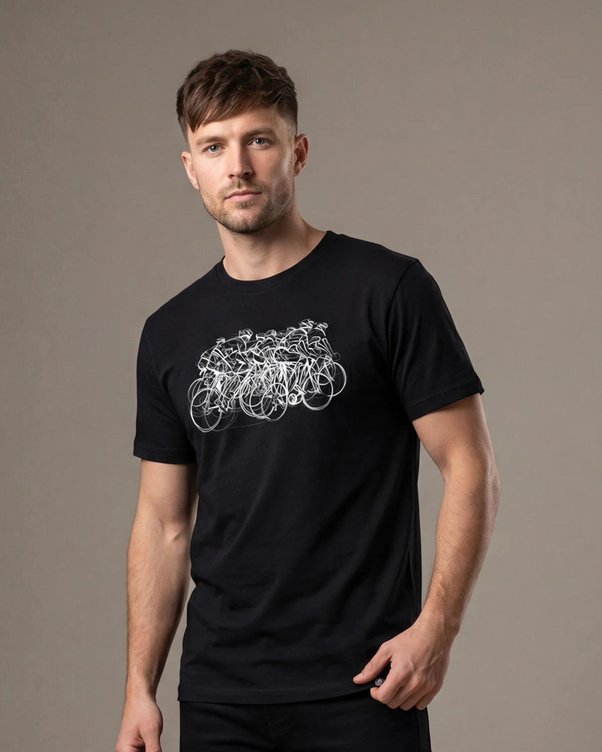 Male model wearing black t-shirt with bicycle sketch graphic, front view