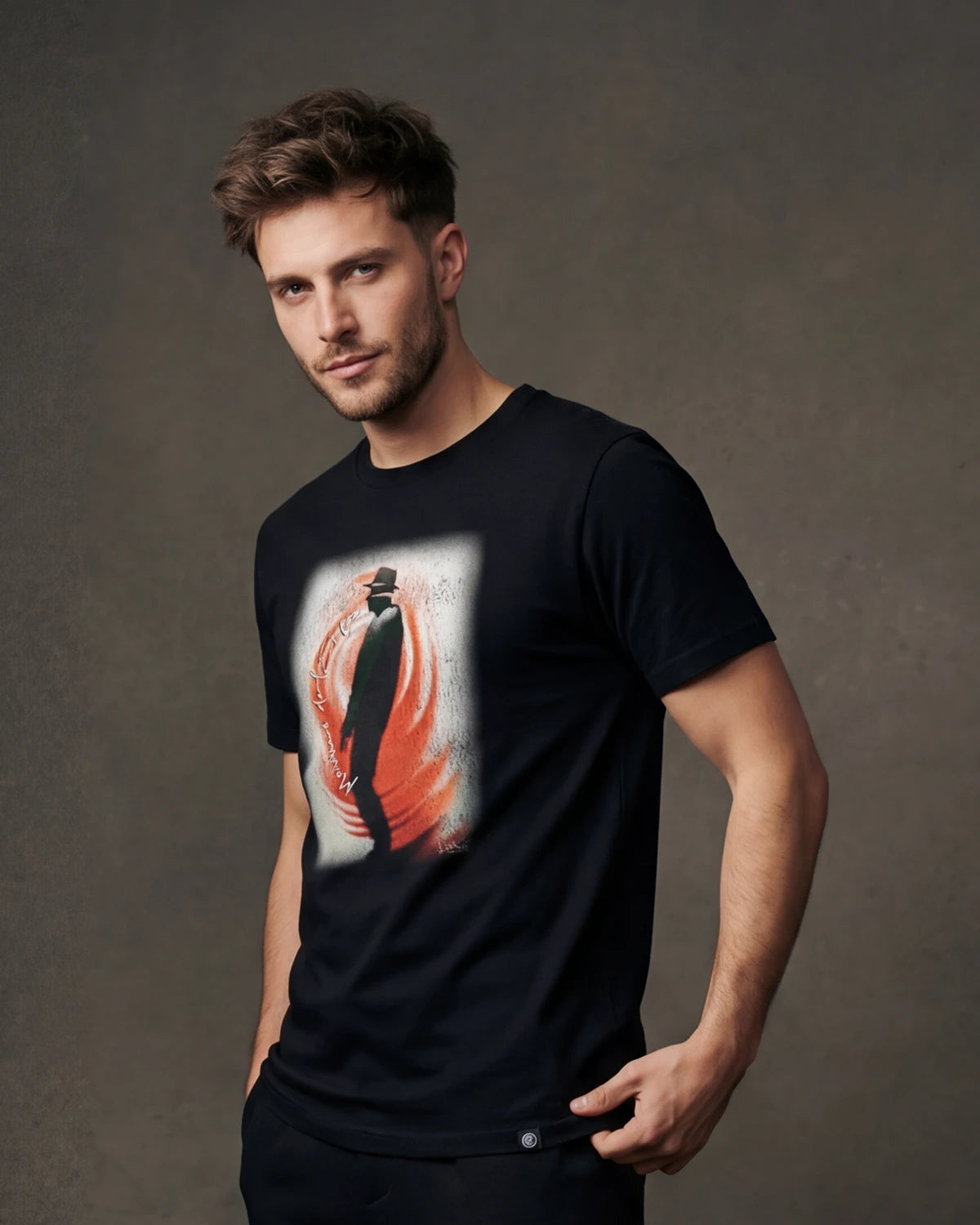 Male model wearing black Inferno Walker t-shirt with figure graphic, front view
