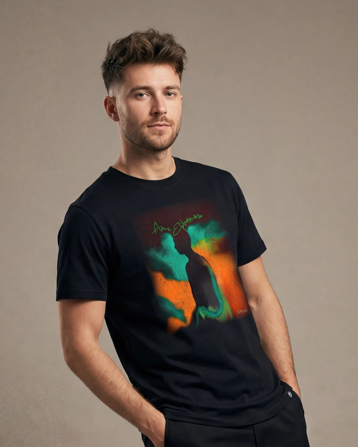 Male model wearing black Ephemeral Soul t-shirt with abstract portrait graphic, front view
