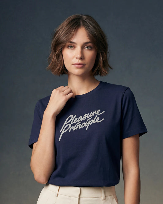 Model wearing denim melange t-shirt with Pleasure Principle text, front view model shot

