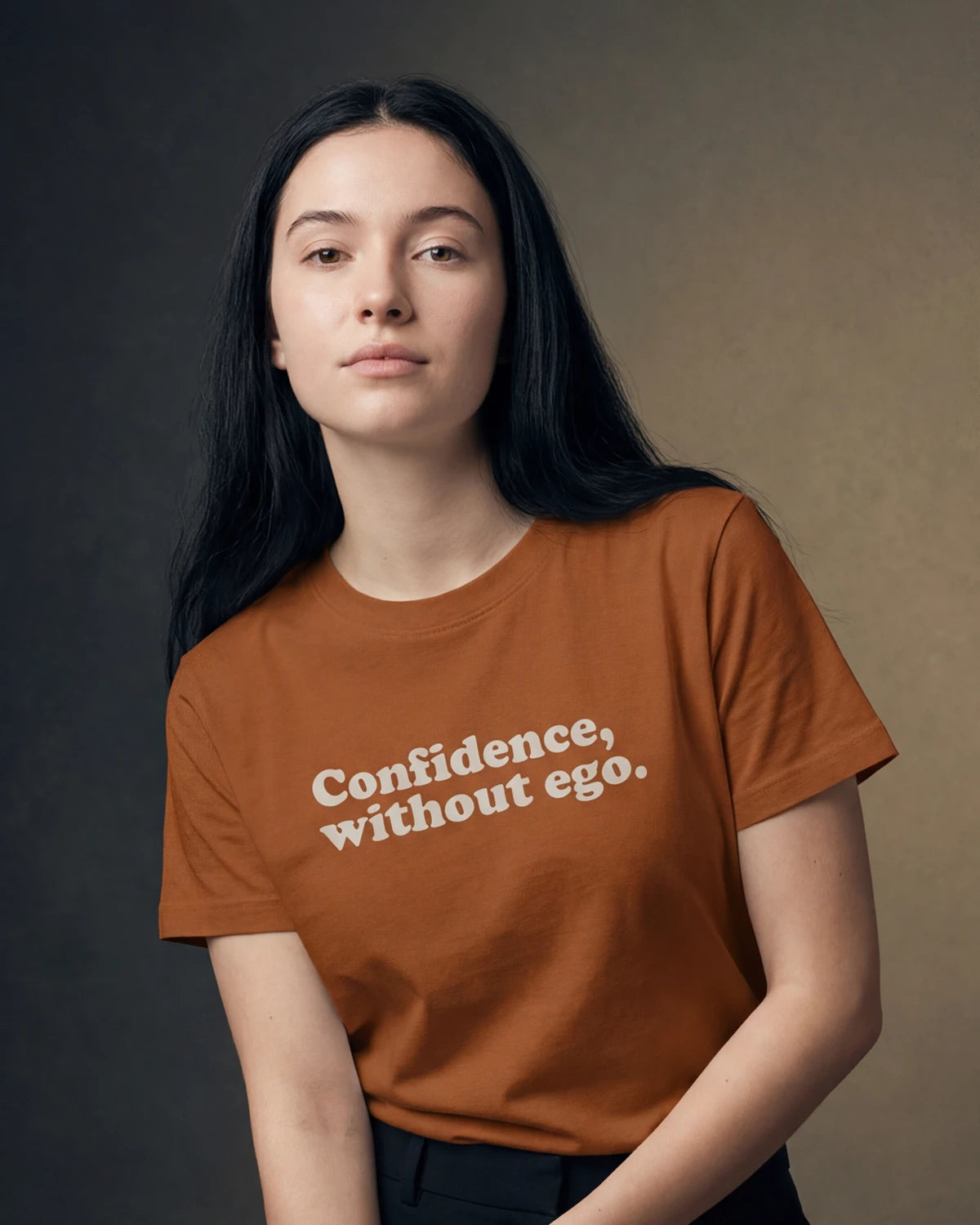 Model wearing new toast t-shirt with Confidence, without ego. text, front view model shot
