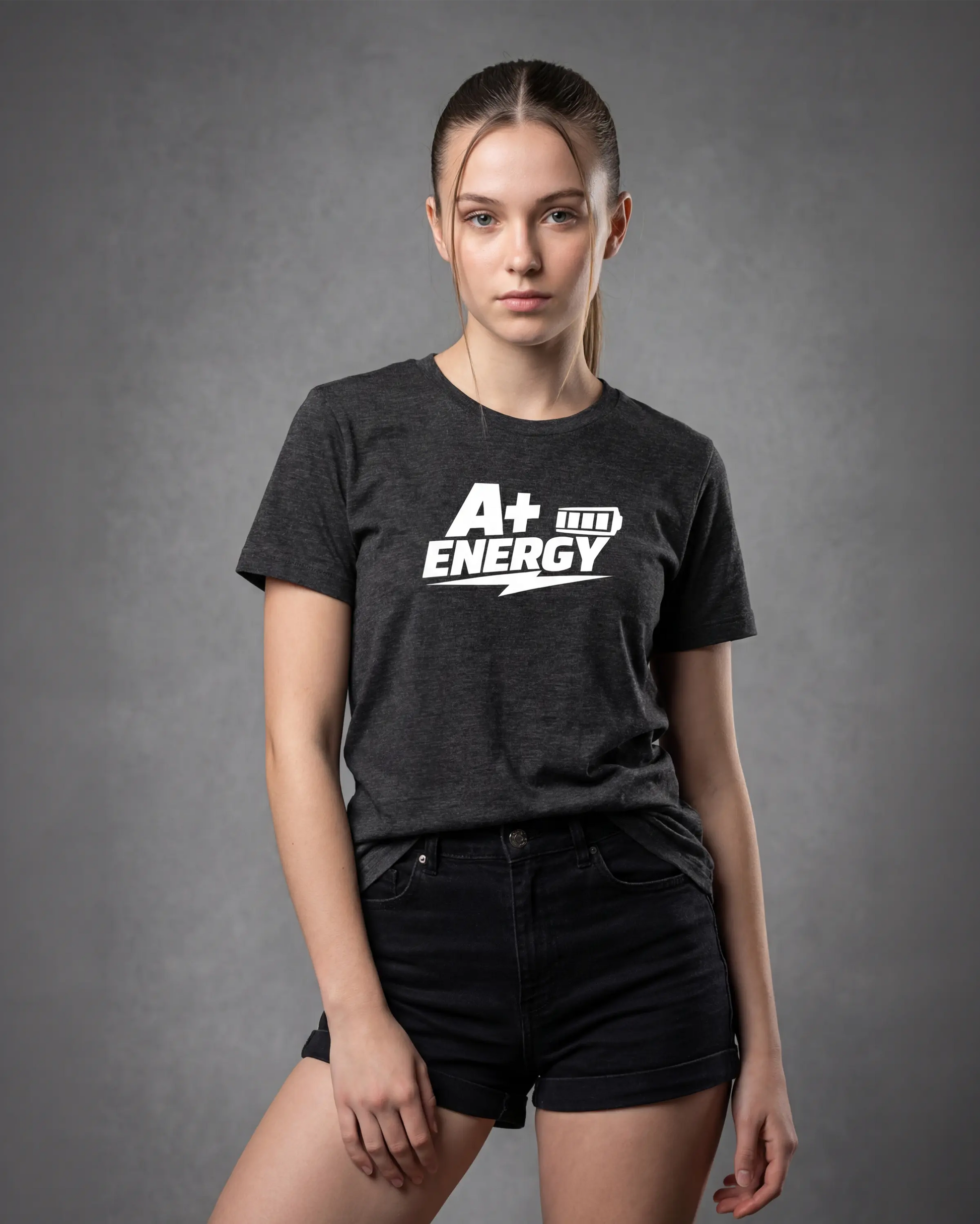 Model wearing charcoal melange t-shirt with A+ ENERGY graphic, front view.
