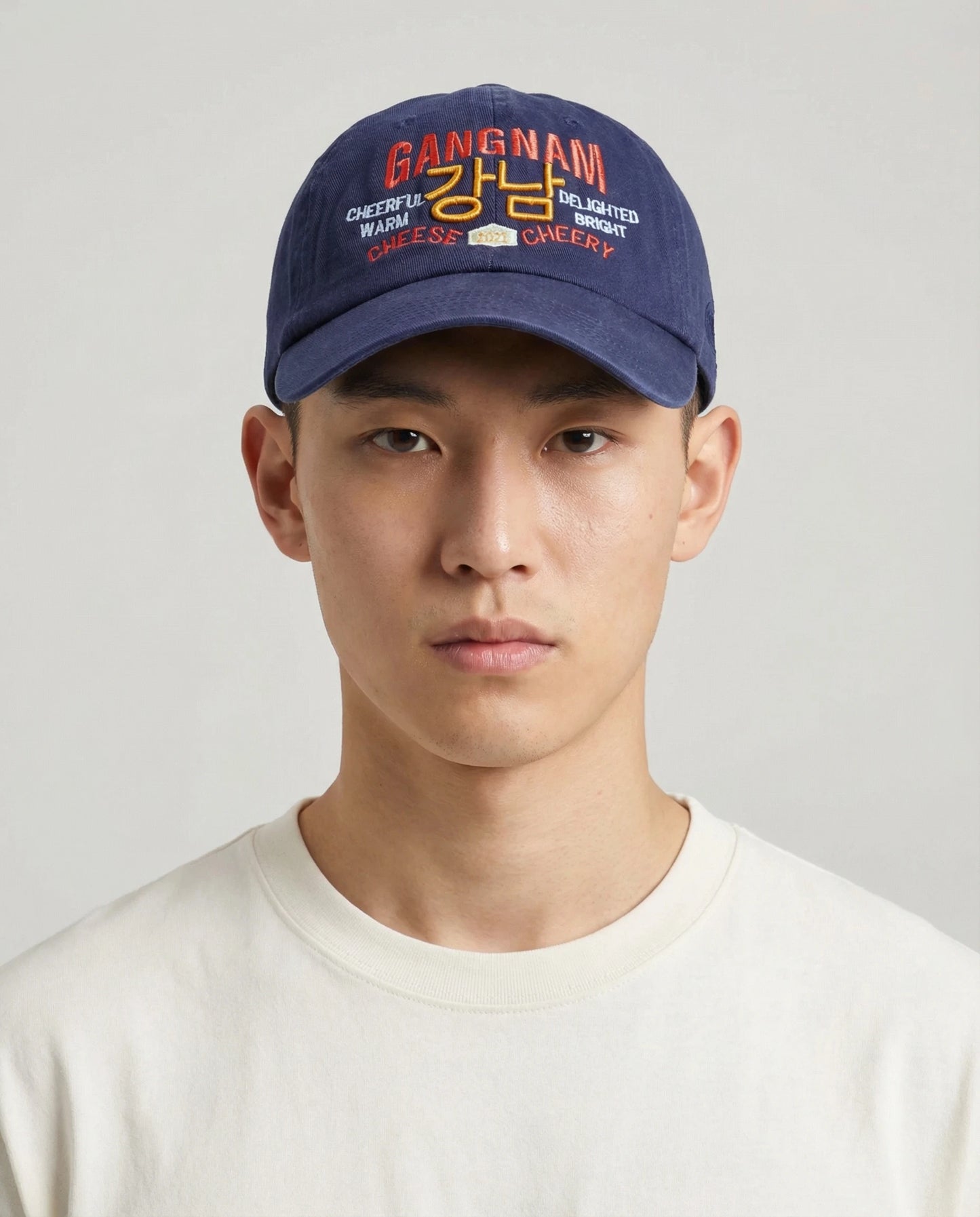 Male model wearing navy Gangnam Dad Cap, front view 